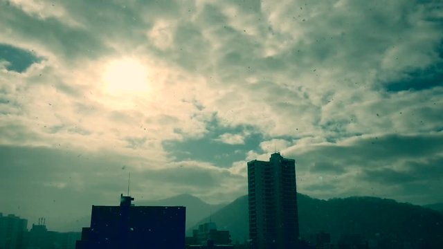 さっぽろの町並みと雪と太陽