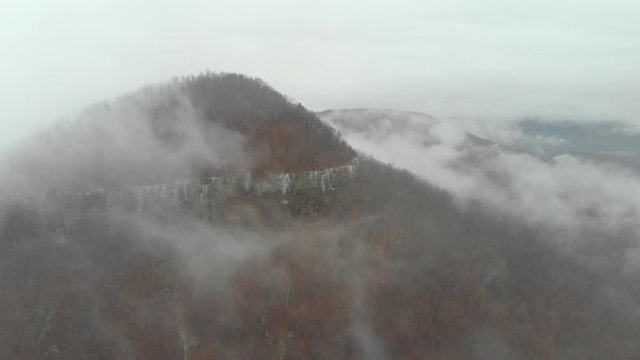 Aerial of Cold Foggy Forest Mountain
