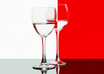 glass of red wine on black background