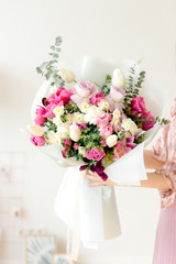 Spring flowers in girl's hands