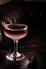 alcoholic beverage prepared in a glass with ice