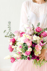 Spring flowers in girl's hands