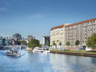 The Spree River in Berlin with Reichstag in the distance