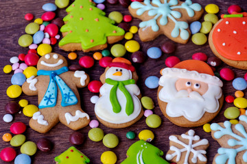 Fototapeta na wymiar Christmas Gingerbread Man Cookies on a Wooden Background .Christmas Food