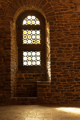 Window detail of interior hall, medieval castle in Ghent, Belgium