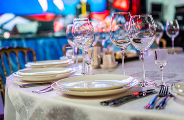 Banquet table setting in a restaurant. Preparing for a corporate party.