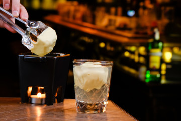 glass of beer on a bar
