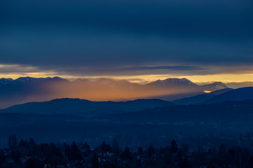 Foggy sunrise over Cascade Mountain Range, WA
