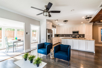 Open floor plan remodel with kitchen, living, sunroom, workspace