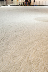 Ice rink background with marks from skating and hockey.