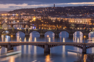 Naklejka premium Bridges in Prague over Vltava river at sunset, Czech Republic