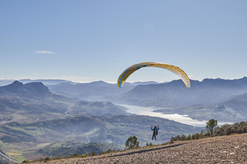 man doing paragliding in Lija Cadiz