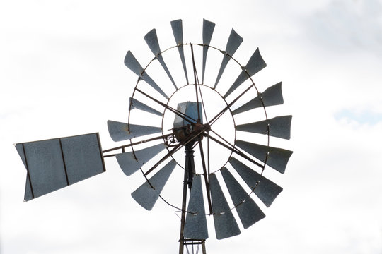 Close up view of a water pumping windmill