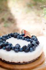 blueberry pie on a wooden table