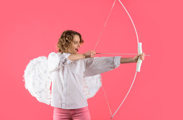 Cupid shoot love arrow with bow for valentine day. Female angel with bow and arrow. Valentines day...