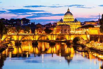Fototapeta na wymiar Vatican City. Saint Peter Basilica and Sant'Angelo Bridge, over Tiber river. 