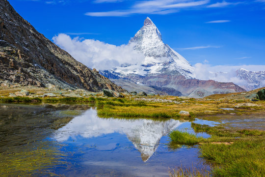 Zermatt, Switzerland. Matterhorn peak reflected in Riffelsee Lake.