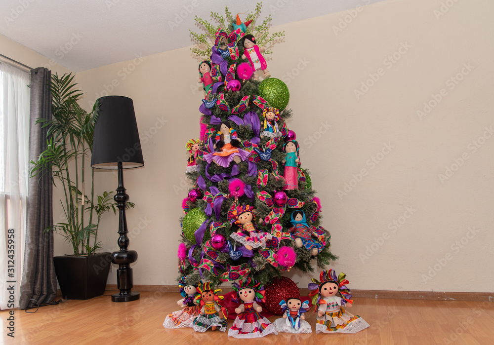 Wall mural  Christmas tree with traditional Mexican decorations, rag dolls, traditional colored ribbons of Mexican culture