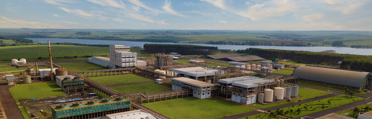 Fototapeta premium Aerial view of industry near river