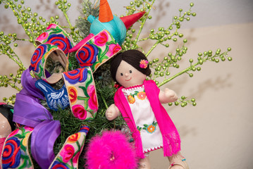  Christmas tree with traditional Mexican decorations, rag dolls, traditional colored ribbons of Mexican culture
