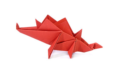 Stegosaurus dinosaur Origami paper art Isolated on white background.