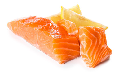 Raw salmon fillet on white background