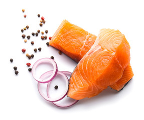 Raw salmon fillet on white background