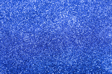 Obraz premium Texture of blue paper with glitter, closeup