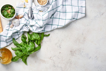 Ingredients for pesto sauce on light background