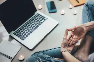 student,business people sitting in room with candle do meditation during work or study improve...