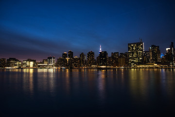 Naklejka na ściany i meble Manhattan Skyline at night in New York City