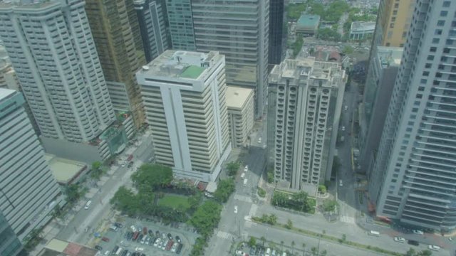 High Angle Time Lapse Shot Of Buildings With Sky Shadows And Traffic