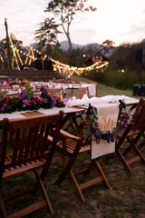 Wedding Ceremony with flowers outside in the garden