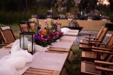 Wedding Ceremony with flowers outside in the garden
