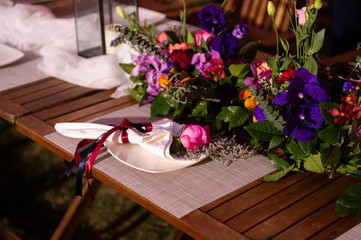 Wedding Ceremony with flowers outside in the garden