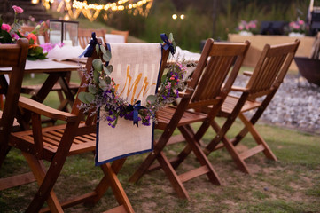 Wedding Ceremony with flowers outside in the garden