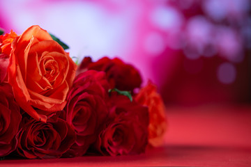Abstract background and texture for Happy Valentine's Day greeting. Love and romantic bouquet of roses on a background of lights.