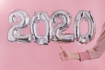 2020 balloon celebrate happy new year background banner or card on bright pink, golden and silver color theme