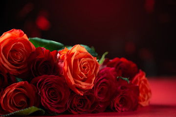 Congratulation on Valentine's Day, roses, flowers, romance. Red background, space for an inscription.