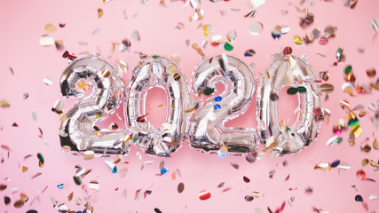 2020 balloon celebrate happy new year background banner or card on bright pink, golden and silver color theme