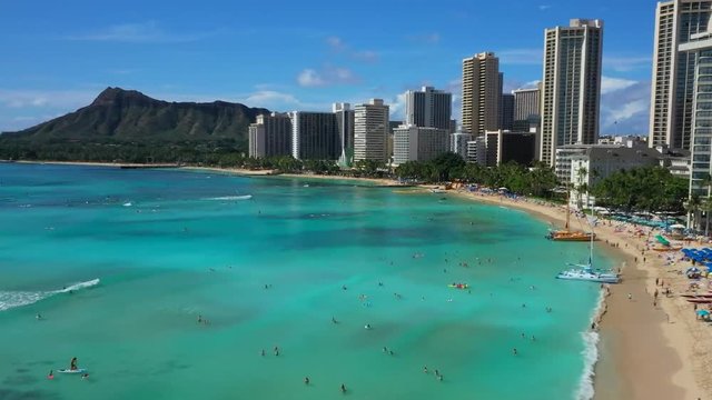 O‘ahu Island, Hawaii - Gorgeous Scenery Of A Green Shallow Waters and Different Buildings - Aerial Shot
