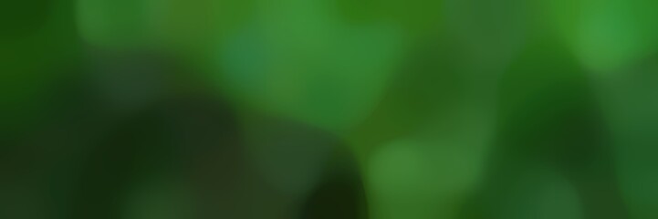 unfocused horizontal background bokeh graphic with very dark green, forest green and dark slate gray colors and space for text or image