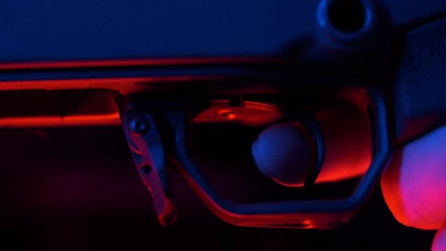 sniper's finger pulling the trigger.