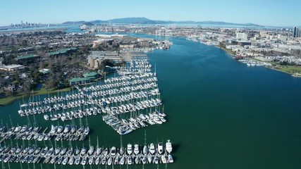 World view pulling back across the city and surrounding marina and bay.