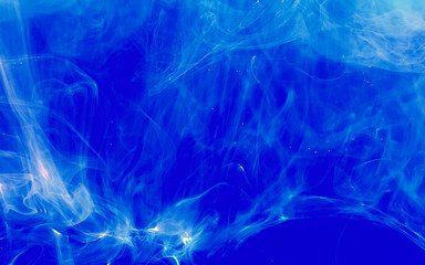 Blue fantastic marine abstract background. Watercolor ink in water.