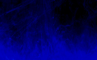 Fototapeta na wymiar Cool trending screensaver. Watercolor ink in water. Beautiful space blue abstract background.