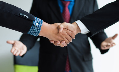 Business cooperation. Lawyers and legal mediation. Business people shake hands after reaching a business agreement. - obrazy, fototapety, plakaty