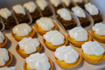 Mini chocolate and lemon pie cakes.