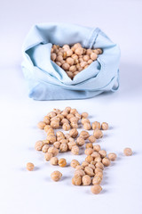 Reusable eco friendly natural cotton produce bags with cereal. Waste packaging. Zero waste food shopping. Plastic free items. Reuse, reduce, recycle, refuse