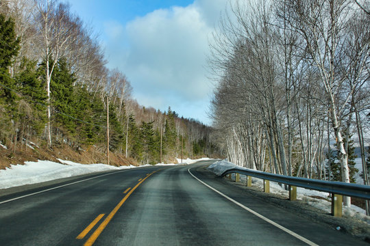 Driving the winding roads and scenic lookouts of the Cabot Trail in Cape Breton, Nova Scotia